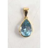 A 9ct gold and aquamarine pendant, the pear cut stone of approximately 1 by 0.7cm, total weight 1.