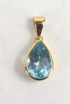 A 9ct gold and aquamarine pendant, the pear cut stone of approximately 1 by 0.7cm, total weight 1.