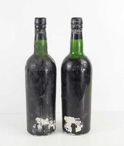 Two bottles of Quinta do Noval 1958 Vintage Port, caps present some sign of seepage, labels