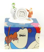 A boxed Coalport table calendar of from The Snowman, together with Ringtons The Snowman Cereal bowl,