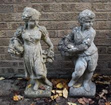 Two reconstituted stone garden statues, one of a young girl holding flowers, 74cm high.