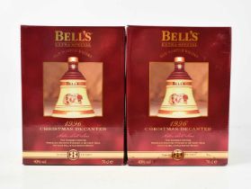 Two bottles of Bells Christmas decanters Old Scotch Whisky, both for 1996, boxed.