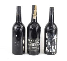 Two bottles of Warre's 1980 Vintage Port, one label absent, one perished, caps present and a