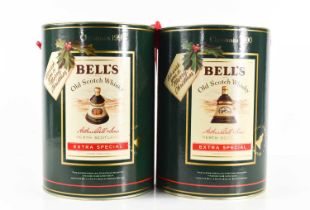 Two bottles of Bell's Extra Special Old Scotch Whisky, in Christmas decanters for 1990 and 1991,