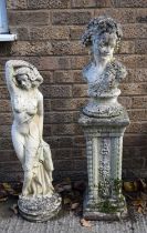 A reconstituted stone garden bust in the form of a female figure on a highly decorative base 105cm