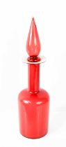 An Otto Braeur for Holmguaard red glass decanter with stopper, 45cm high.