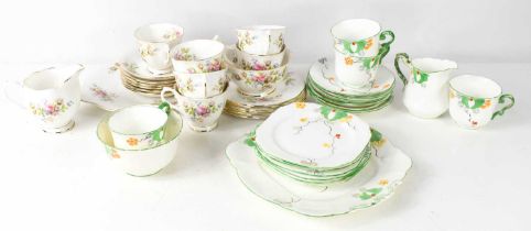 A Paragon porcelain part tea service, together with a Royal Albert Bone China part set, in the
