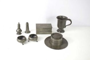 A group of antique pewter wear to include an inkwell with glass liner, tankard, pair of salt