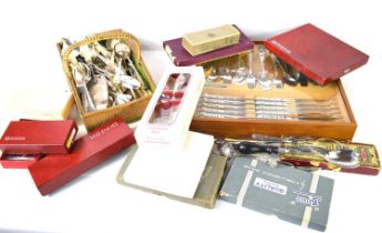 A collection of silver plated cutlery to include a complete set by Oneida and other vintage