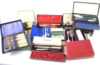 A large collection of vintage silver plated and some stainless boxed flatware, to include some