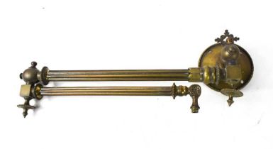 A Victorian brass reeded extending gas mantle with circular back plate.