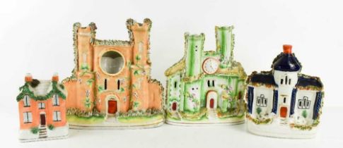 Four pieces of 19th century Staffordshire pottery, including castle form pocket watch holder, and