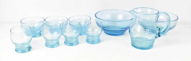A mid 20th century blue glass jug with four glasses, two serving bowls, and six dessert bowls with