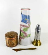A group of WWI items, comprising a commemorative hand painted milk glass vase, 28cm high, a