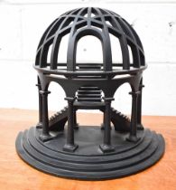 A wooden 20th century architectural arch / stair display, painted in black.