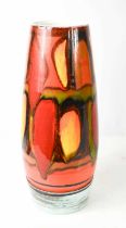 A large Poole Pottery sleeve vase with red orange and green abstract design and a blue border to the