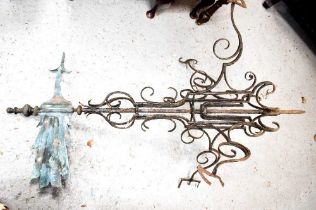 A 19th century wrought iron weather vane, reputedly from a Rutland church, the body of black painted