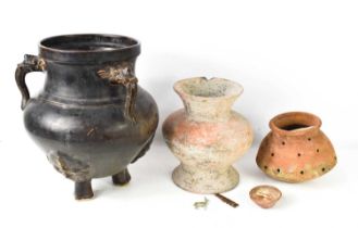 A group of early terracotta wares, to include excavated gourd type vase, a strainer jar, a small