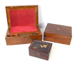 An antique mahogany writing box, the lid opening to reveal a red felt skiver together with a smaller