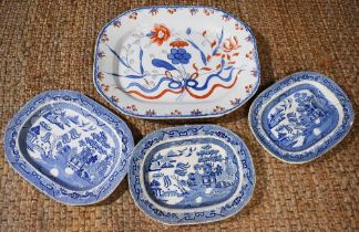 A large blue, white and ironstone red meat platter in the Chinese style, together with three