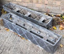 A pair of lead window boxes, 86cms by 17cms by 16.5cms tall