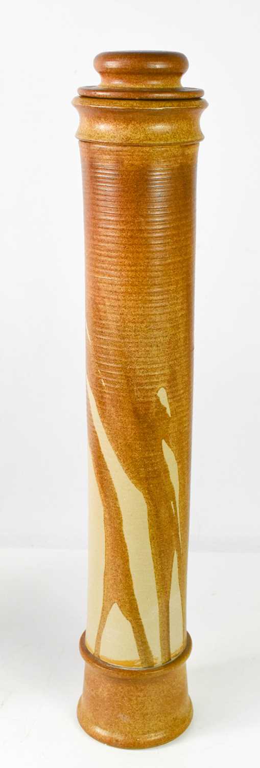 A Studio Pottery tall cylindrical jar and cover, 58cm high, with impressed marks to the base.