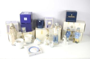 A group of Nao figurines and Lladro ornaments and pots to include a young girl looking at her dog, a