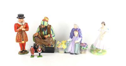 A group of figurines comprising of Royal Doulton "Cobbler" HN1706, La Sylphide HN2138, Granny's