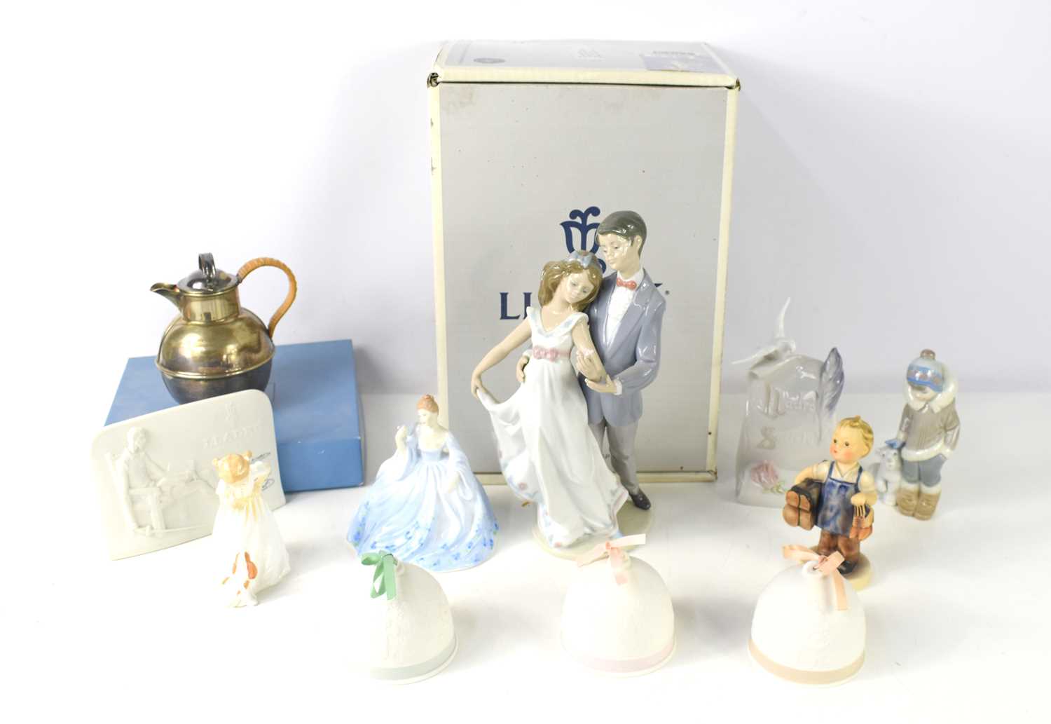 A group of porcelain figurines and ornaments to include Lladro now and forever number 07642,