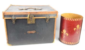 An antique leather bound travelling trunk, the lock stamped Eagle Lock Company USA, 37cm high by