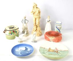 A group of figurines to include examples by Lladro and Royal Doulton together with a Royal