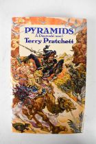 Terry Pratchett: 'Pyramids', first edition, first printing, published by Victor Gollancz Ltd.