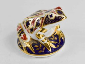 A Royal Crown Derby paperweight in the form of a frog, gold stopper, 8cm high.