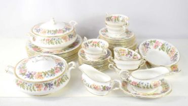 A Paragon dinner service in the "Country Love" pattern, comprising of tureens, soup bowls, gravu