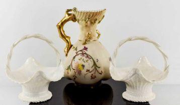 A Royal Worcester blush porcelain jug with gilt branch form handle, 19cm high, decorated with