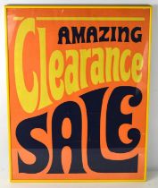 A vintage 1960's/1970's poster, stating 'Amazing Clearance Sale', 70 by 55cm, framed and glazed.