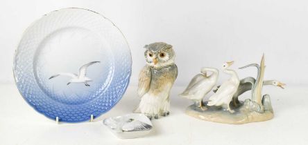 A Lladro figure group of geese, number 4549, a Nao Owl, a German porcelain trinket dish modelled