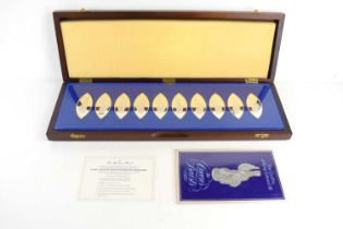 A cased set of ten Danbury Mint silver ingots of navette form and depicting the queens beasts,