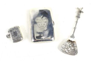 A Victorian silver cigarette case together with a silver vesta case and a Dutch silver spoon with