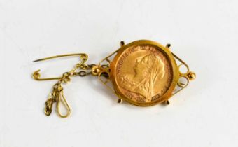 An 1899 Victoria veiled head half sovereign, in 9ct gold brooch mount, total weight 6.55g.