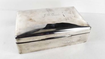 A silver cigar box, to J T Goode, by Walker & Hall, Sheffield 1918, 24 by 15 by 8cm.