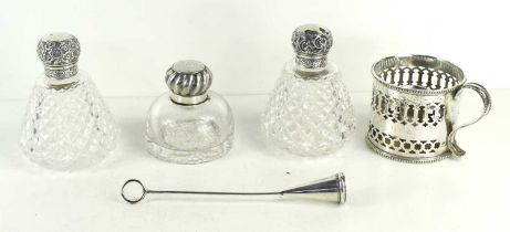 An antique silver plate chamberstick and snufferm the hold with pierced decoration together with two