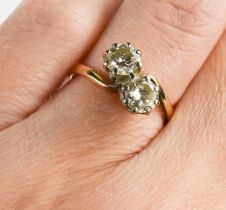 An 18ct gold and platinum diamond 'Toi et Moi' ring, each brilliant cut diamond approximately 1/2