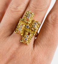 An 18ct gold and diamond brutalist ring, set with nine brilliant cut diamonds, size P, 8.5g. 2.5