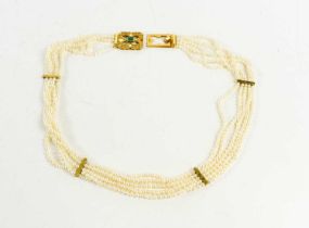 A five strand seed pearl choker with 18ct gold and emerald set clasp in the Byzantine style and four