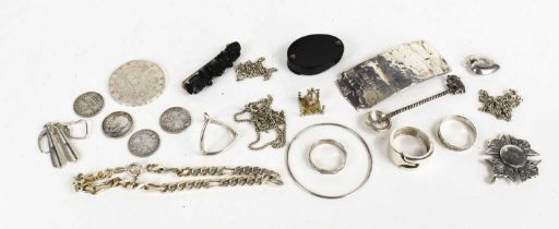 A group of silver jewellery to include necklaces, a pair of drop earrings, four rings of various