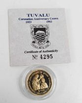 A 14ct gold Tuvalu Coronation Anniversary $100 Crown, numbered 4295, complete with original