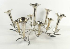 An Art Nouveau style silver plated eperne centrepiece, in the form of flowers on a foliate base,