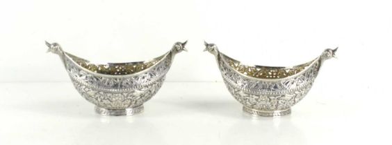 A pair of unusual 19th century Indian white metal (likely silver) boat shaped Bon Bon dishes,