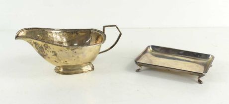 A silver sauce boat, gadrooned border, hallmarked for S. Blanckensee & Son Ltd, Birmingham, together